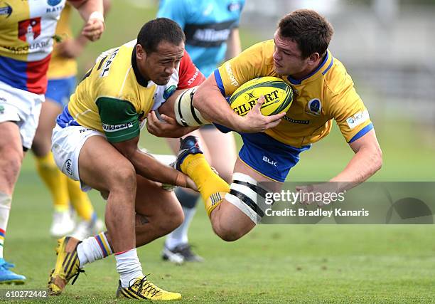 Michael Gunn of Brisbane City is tackled during the round five NRC match between Brisbane City and Sydney Rays at Ballymore Stadium on September 25,...