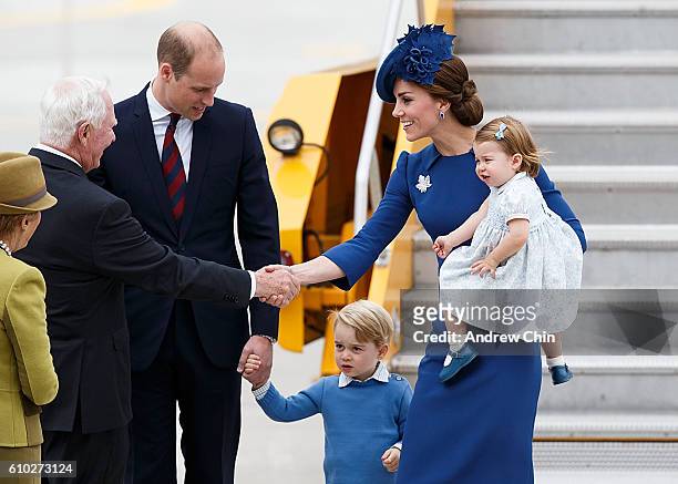 Catherine, Duchess of Cambridge with Princess Charlotte of Cambridge greets David Johnston, Governor General of Canada upon arriving at 443 Maritime...