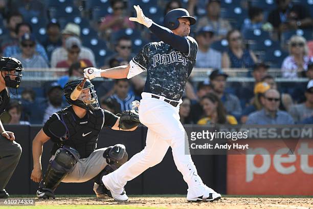 Oswaldo Arcia of the San Diego Padres hits during the game against the Colorado Rockies at PETCO Park on September 11, 2016 in San Diego, California.
