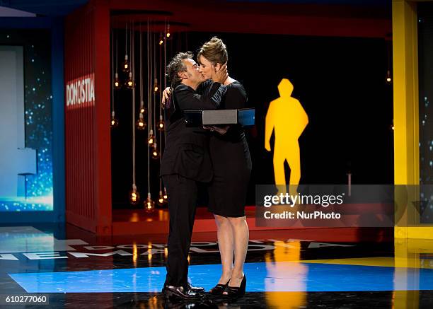 Eduard Fernandez receives the Silver Shell Award for Best Actor for the film 'El Hombre De Las Mil Caras' during the closing ceremony of the 64th San...