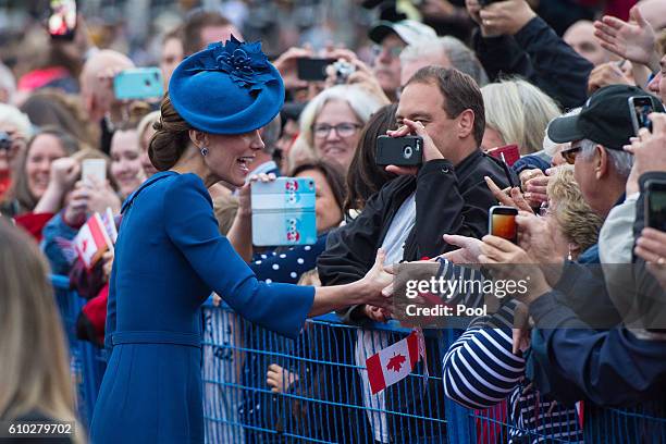 Catherine, Duchess of Cambridge greets crowds as she attends an official welcome ceremony at the Legislative Assembly of British Columbia at Victoria...