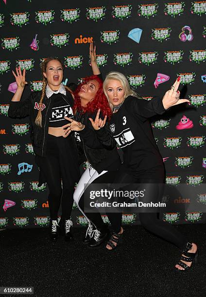 Lauren Bennett, Natasha Slayton and Jazzy Mejiaon of G.R.L pose the media wall ahead of the Nickelodeon Slimefest 2016 evening show at Margaret Court...
