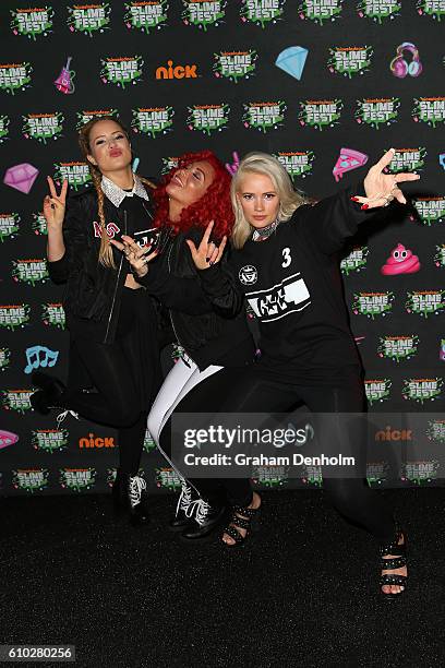 Lauren Bennett, Natasha Slayton and Jazzy Mejiaon of G.R.L pose the media wall ahead of the Nickelodeon Slimefest 2016 evening show at Margaret Court...