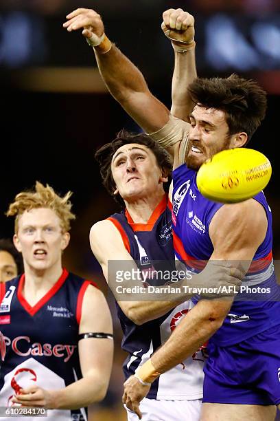 Oscar McInerney of Casey and Tom Campbell of Footscray compete in the ruck during the VFL Grand Final match between the Casey Scorpions and the...