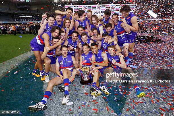 Footscray players celebrate winning during the VFL Grand Final match between the Casey Scorpions and the Footscray Bulldogs at Etihad Stadium on...