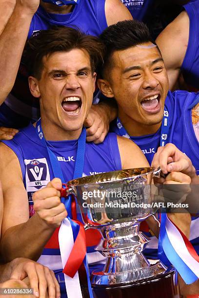 Jed Adcock and Lin Jong celebrates the win during the VFL Grand Final match between the Casey Scorpions and the Footscray Bulldogs at Etihad Stadium...