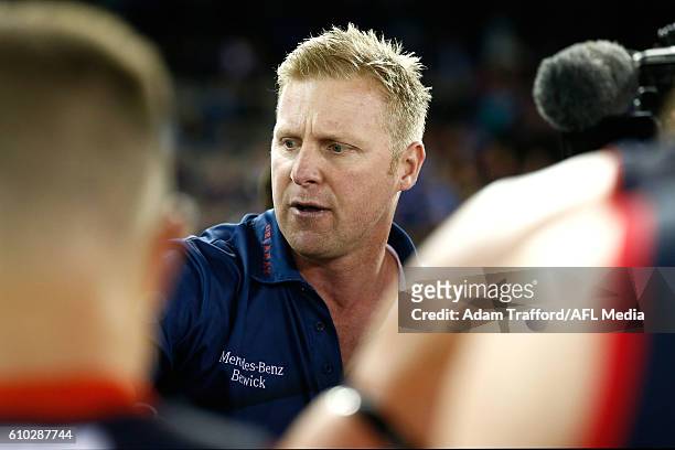 Justin Plapp, Senior Coach of the Scorpions addresses his players during the VFL Grand Final match between Footscray Bulldogs and Casey Scorpions at...