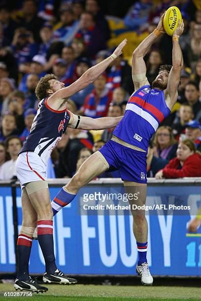Tom Campbell of Footscray marks the ball against Jake Spencer during the VFL Grand Final match between the Casey Scorpions and the Footscray Bulldogs...