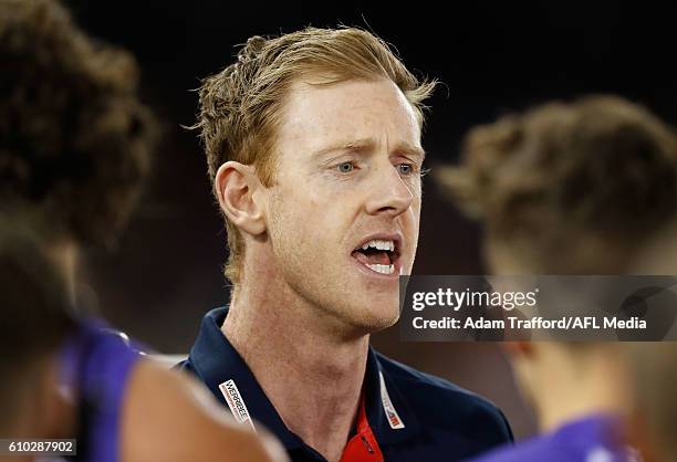 Ashley Hansen, Senior Coach of the Bulldogs addresses his players during the VFL Grand Final match between Footscray Bulldogs and Casey Scorpions at...