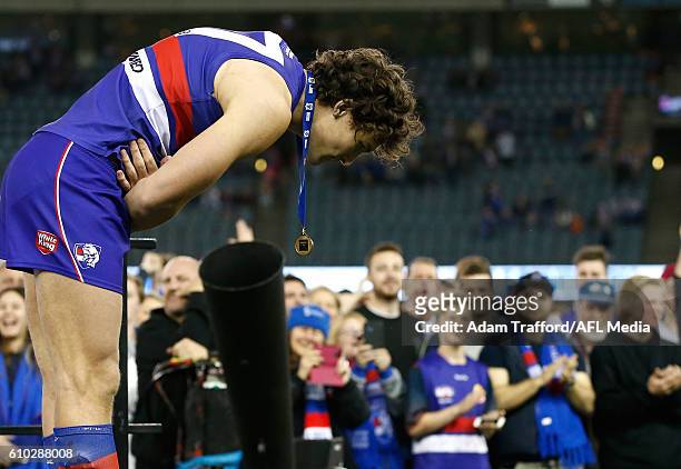 Will Minson of the Bulldogs takes a bow to thank fans during the VFL Grand Final match between Footscray Bulldogs and Casey Scorpions at Etihad...