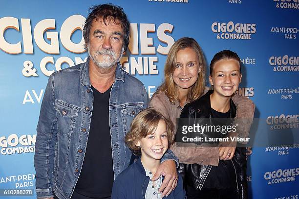 Actor and Director Olivier Marchal, his wife Actress Catherine Marchal, them son Basile and them daughter Ninon attend the "Cigognes & Compagnie"...