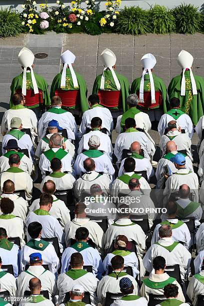 Priests and bishops attend a mass marking the Jubilee for Catechists in Saint Peter's Square at the Vatican on September 25, 2016. / AFP PHOTO /...