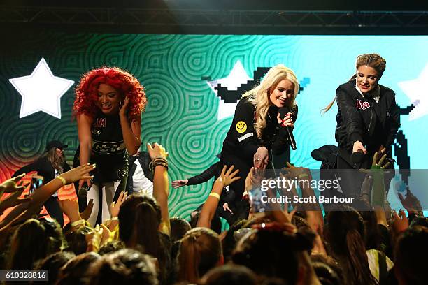 Lauren Bennett, Natasha Slayton and Jazzy Mejia of G.R.L perform during the Nickelodeon Slimefest 2016 evening show at Margaret Court Arena on...