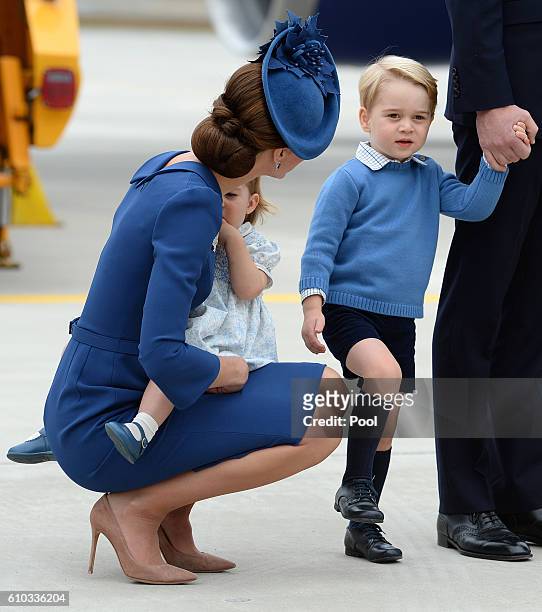 Catherine, Duchess of Cambridge and Princess Charlotte fo Cambridge and Prince George of Cambridge arrive at Victoria Airport for the start of the...