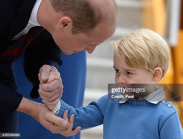 Prince Wiliam, Duke of Cambridge and Prince George of Cambridge arrive at Victoria Airport for the start of the Royal Tour on September 24, 2016 in...