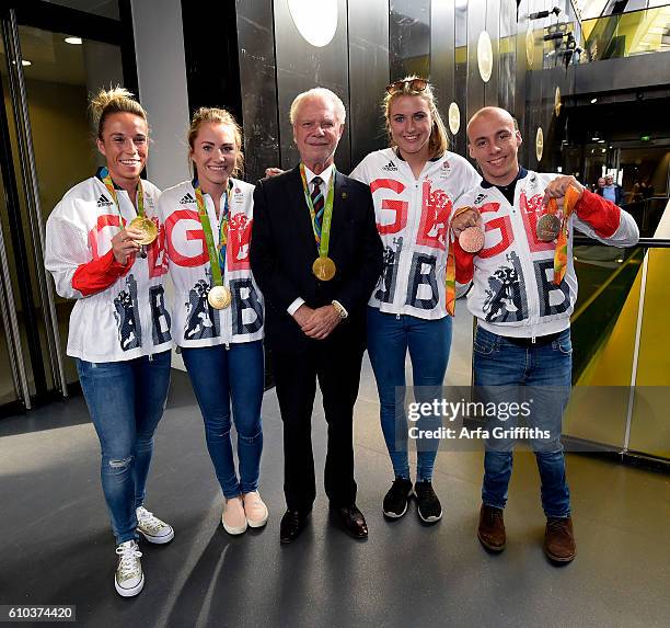 Joint Chairman David Gold of West Ham United is flanked by Olympians Susannah Townsend, Lily Owsley, Shona McCallin and Andy Lapthorne prior to the...