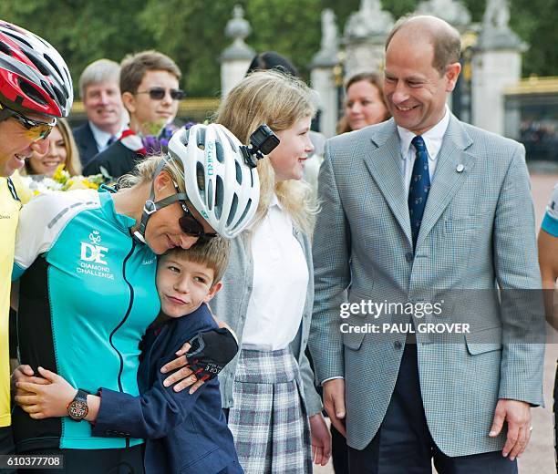 Britain's Sophie, Countess of Wessex is greeted by her son, James, Viscount Severn, Britain's Prince Edward, Earl of Wessex and her daughter Lady...