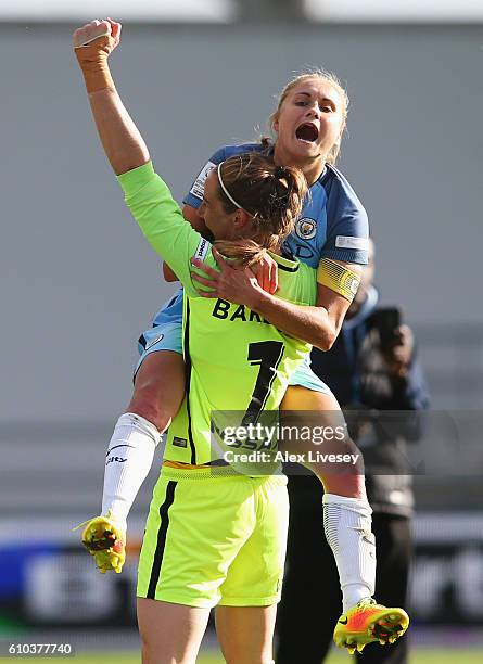 Steph Houghton and Karen Bardsley of Manchester City Women celebrate as they win the WSL title after the WSL 1 match between Manchester City Women...