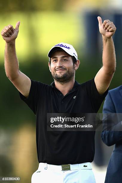 Alexander Levy of France celebrates victory in the final round of the Porsche European Open at Golf Resort Bad Griesbach on September 25, 2016 in...