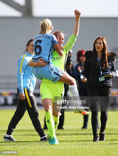 Steph Houghton and Karen Bardsley of Manchester City Women celebrate as they win the WSL title after the WSL 1 match between Manchester City Women...