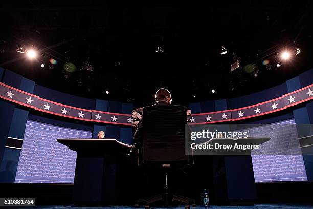 Students acting as 'stand-ins' for Democratic presidential candidate Hillary Clinton and Republican presidential candidate Donald Trump take part in...