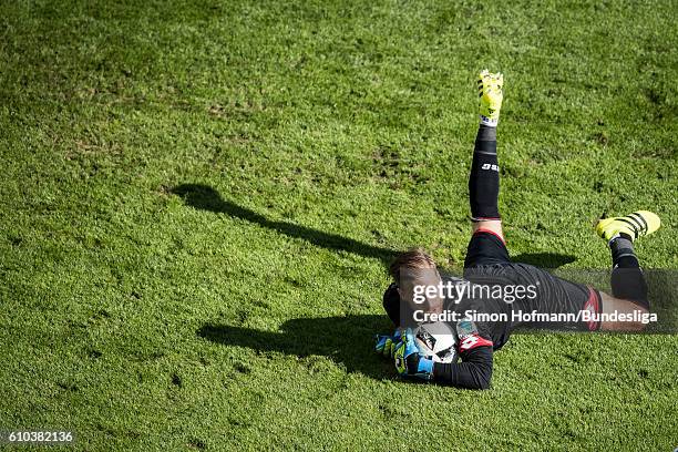 Oliver Baumann of Hoffenheim makes a during the Bundesliga match between TSG 1899 Hoffenheim and FC Schalke 04 at Wirsol Rhein-Neckar-Arena on...