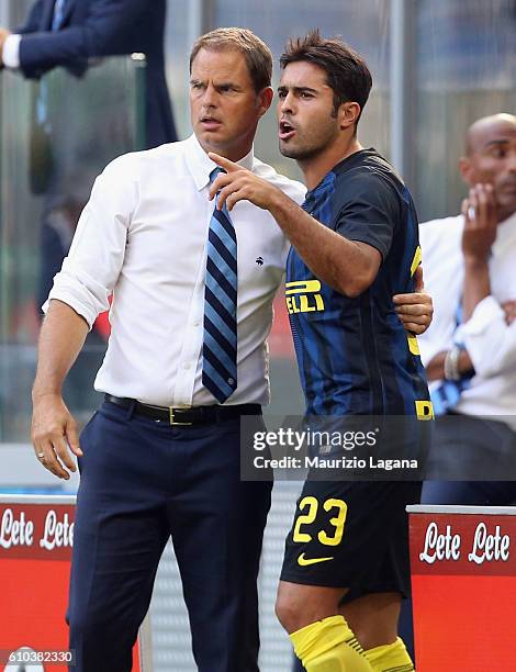 Eder and Frank de Boer of Inter during the Serie A match between FC Internazionale and Bologna FC at Stadio Giuseppe Meazza on September 25, 2016 in...