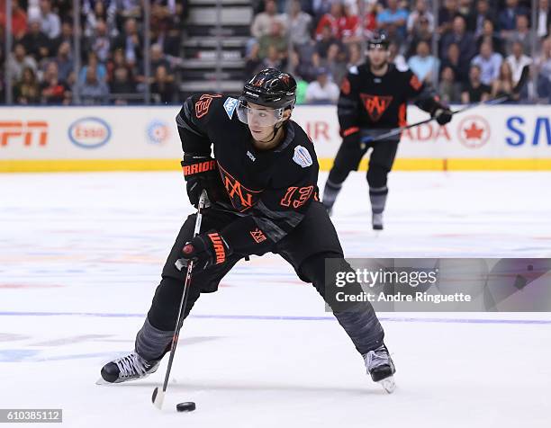 Johnny Gaudreau of Team North America stickhandles the puck against Team Russia during the World Cup of Hockey 2016 at Air Canada Centre on September...