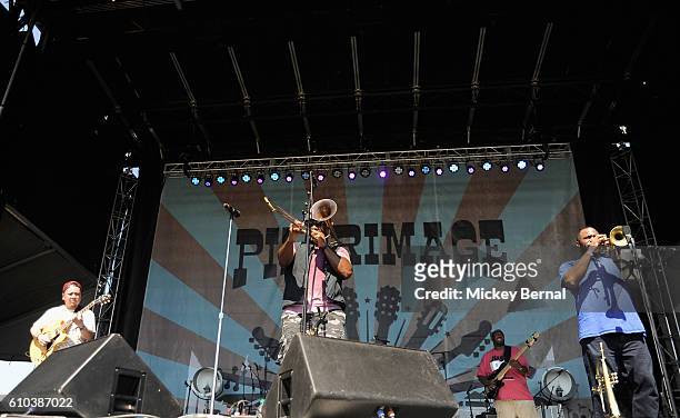 Musicians Seizo Shibayama, Sammie 'Big Sam' Williams, Jerry JBlakk Henderson, and Drew "da phessah" Baham of Big Sam's Funky Nation perform onstage...