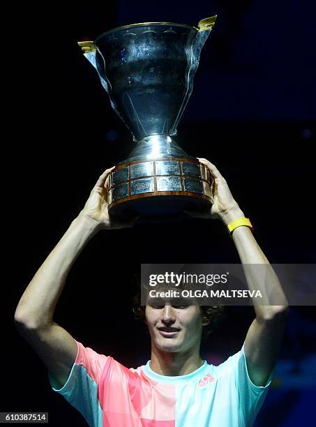 Germanys Alexander Zverev celebrates with his trophy after winning the St. Petersburg ATP Open final tennis match against Switzerlands Stanislas...