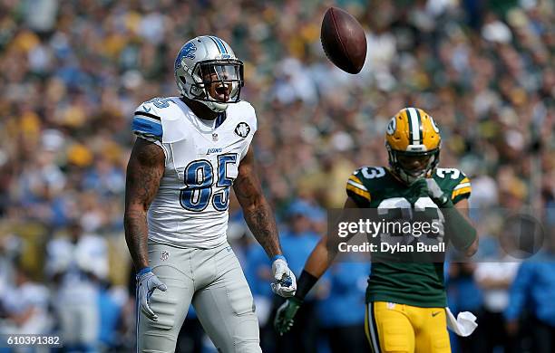 Eric Ebron of the Detroit Lions celebrates after making a catch in the first quarter against the Green Bay Packers at Lambeau Field on September 25,...