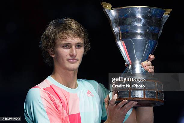 Alexander Zverev of Germany holds his trophy after winning the St. Petersburg Open ATP tennis tournament final match against Stan Wawrinka of...
