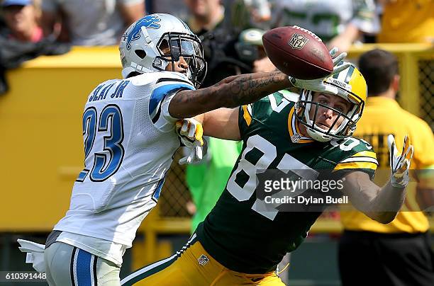 Darius Slay of the Detroit Lions breaks up a pass intended for Jordy Nelson of the Green Bay Packers in the second quarter at Lambeau Field on...