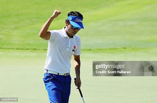 Kevin Na celebrates a birdie putt on the 18th hole during the final round of the TOUR Championship at East Lake Golf Club on September 25, 2016 in...