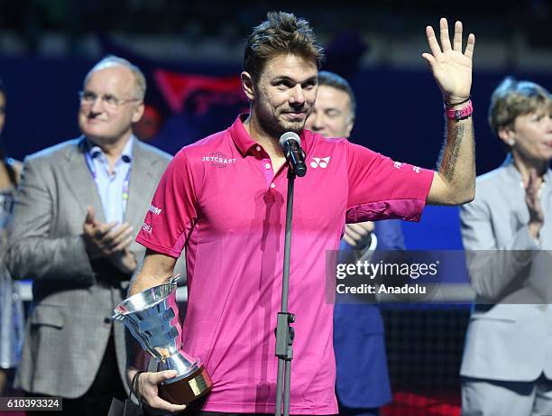 Stan Wawrinka of Switzerland holds his trophy after the final game of Men's singles of Saint-Petersburg Open 2016 International Tennis Tournament at...