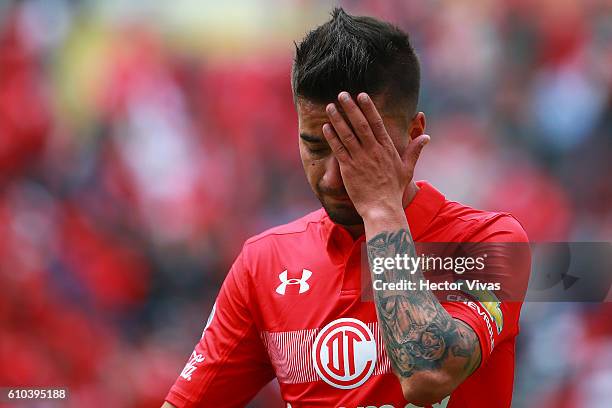 Rodrigo Gomez of Toluca reacts during the 11th round match between Toluca and Leon as part of the Torneo Apertura 2016 Liga MX at Universitario...