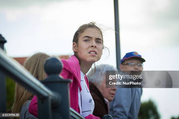 Spectator is seen looking out for on coming rowing boats during a regatta on 25 September 2016, in Bydgoszcz, Poland. Temperatures plummeted...