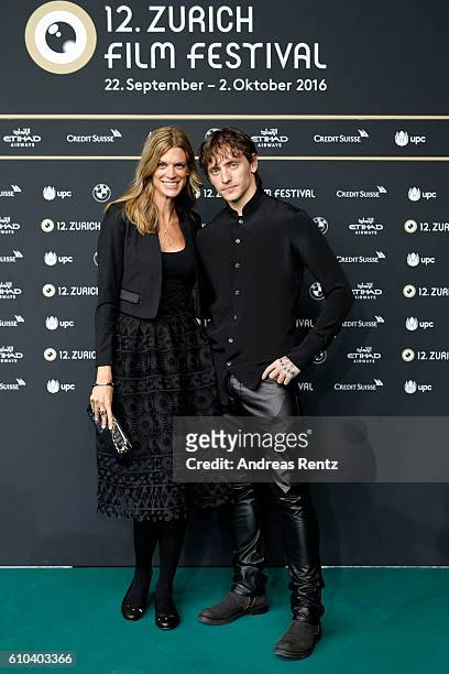 Festival director Nadja Schildknecht and Sergei Polunin attend the 'Dancer' Photocall during the 12th Zurich Film Festival on September 25, 2016 in...