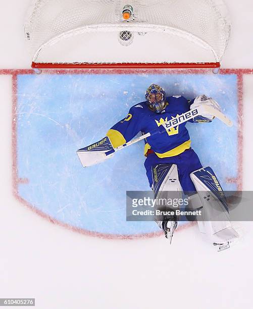 Henrik Lundqvist of Team Sweden hits the ice after giving up a goal to Tomas Tatar of Team Europe at 12 seconds of the third period at the semifinal...
