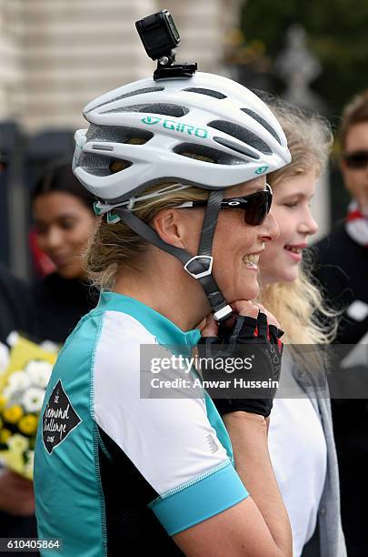 Sophie, Countess of Wessex smiles in the forecourt of Buckingham Palace after finishing her bike ride from Edinburgh to London in support of The Duke...