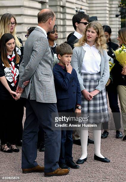 Prince Edward, Earl of Wessex and his children Lady Louise Windsor and James, Viscount Severn wait for Sophie, Countess of Wessex to arrive in the...