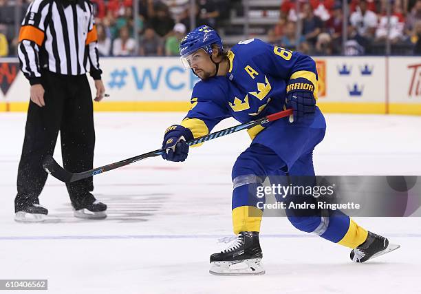 Erik Karlsson of Team Sweden fires a shot on Team Finland during the World Cup of Hockey 2016 at Air Canada Centre on September 20, 2016 in Toronto,...