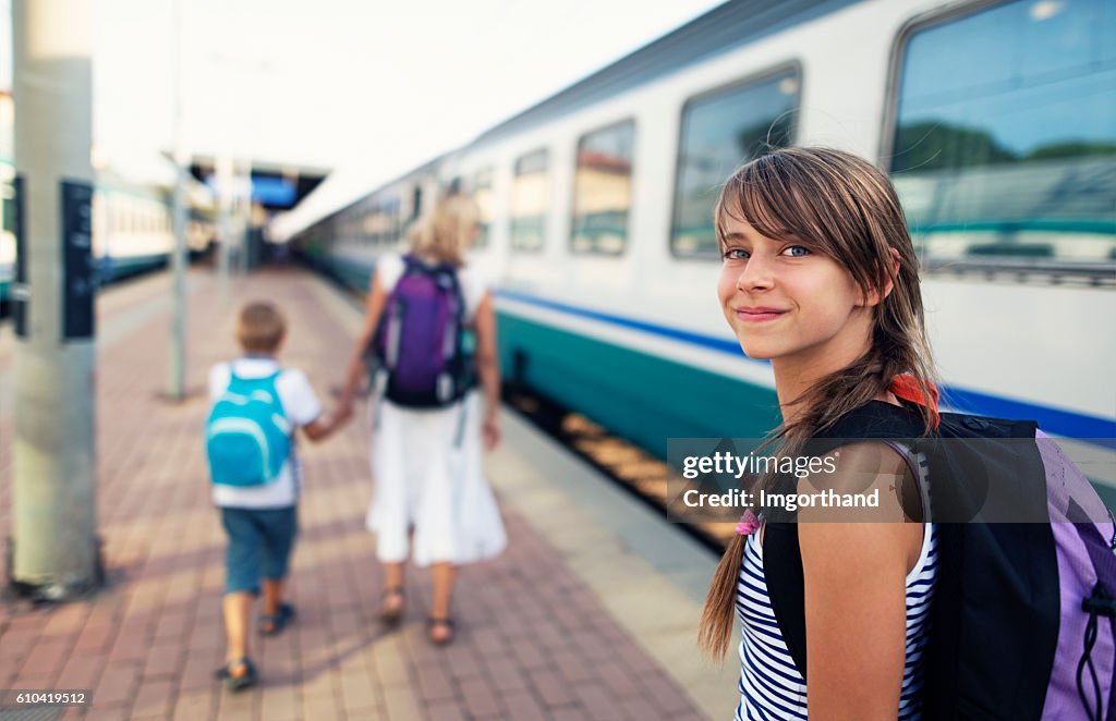 Teenage girl travelling by train in Italy