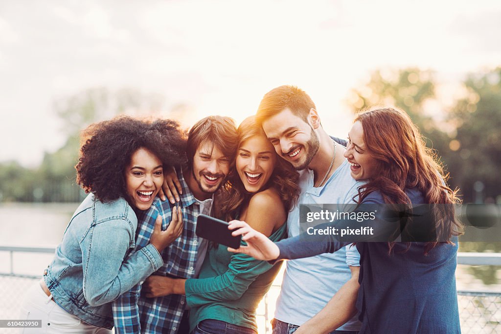 Group of friends making selfie