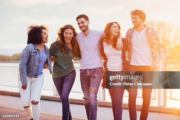 friendship and happiness - live in levis event stock pictures, royalty-free photos & images