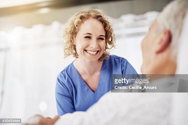 i'm glad to see you doing so well - smiling nurse stock pictures, royalty-free photos & images