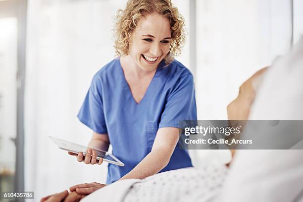 you'll be outta here in no time - nurse smiling stock pictures, royalty-free photos & images