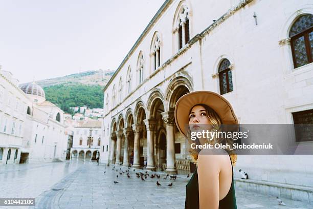 woman in dubrovnik od town - dubrovnik stock pictures, royalty-free photos & images