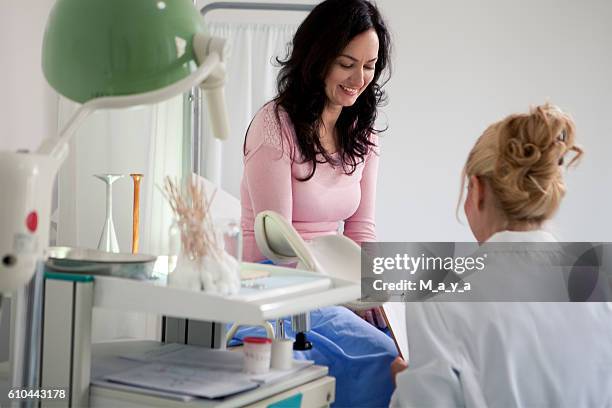 having advise with a gynecologist - pelvic exam stock pictures, royalty-free photos & images