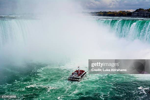 niagara falls with hornblower cruise - horseshoe falls niagara falls stock pictures, royalty-free photos & images